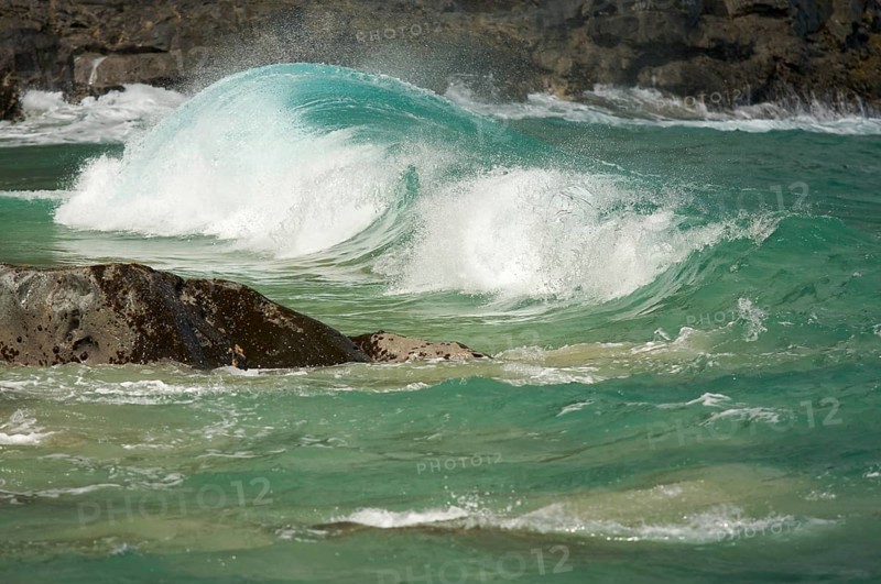 Crashing wave on the na pali coast
