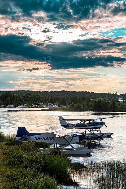 Waterplane at sunset on Lake Inari
