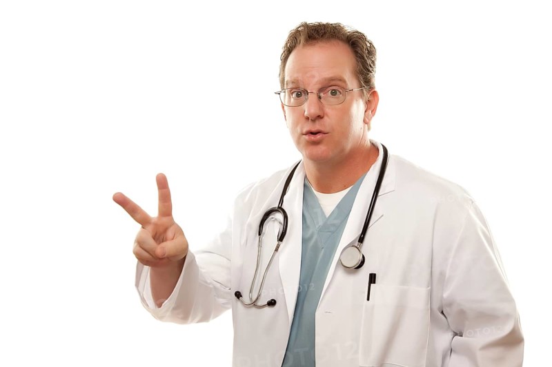 Male doctor with two fingers up isolated on a white background