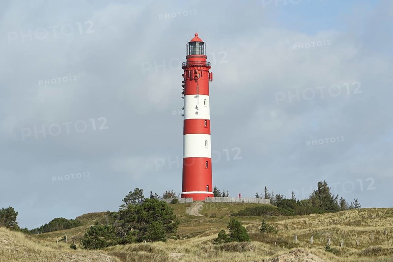 Lighthouse in dune landscape