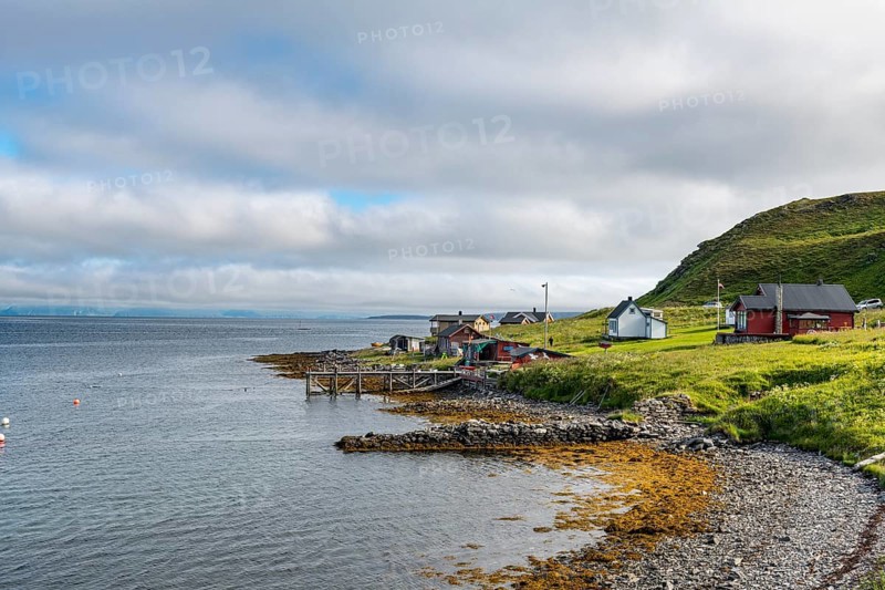 Remote little bay and settlement along the road to the Nordkapp