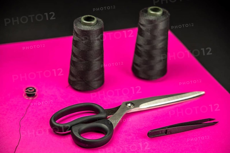 Black tailoring accessories as scissors