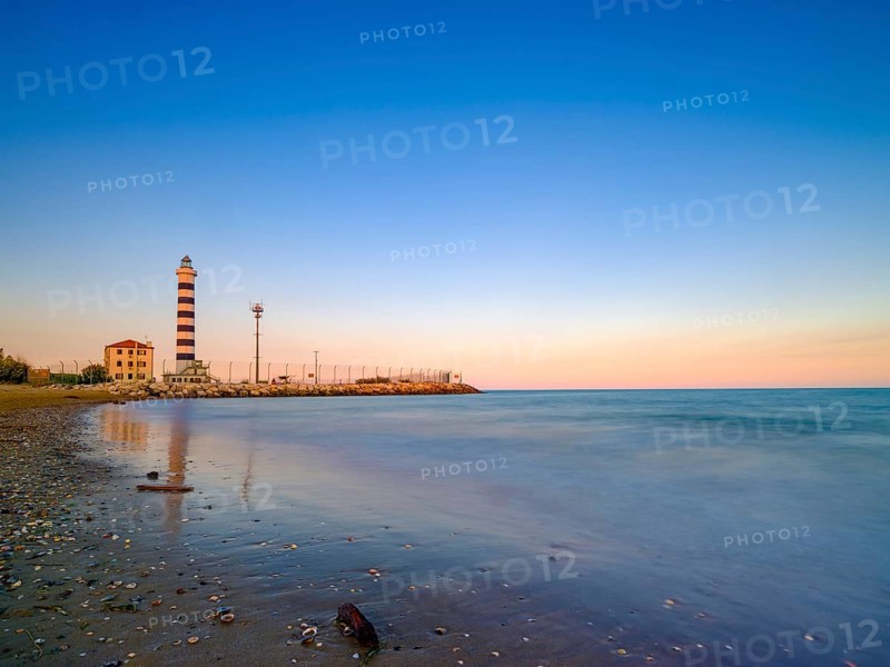 Lighthouse Faro and Adriatic Sea in the evening light