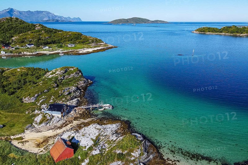 Aerial of a remote little bay and settlement along the road to the Nordkapp