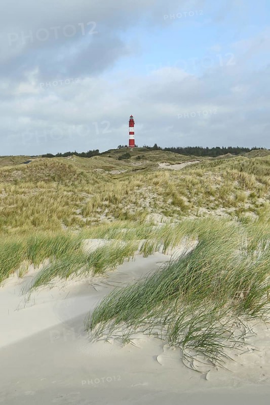 Lighthouse in dune landscape