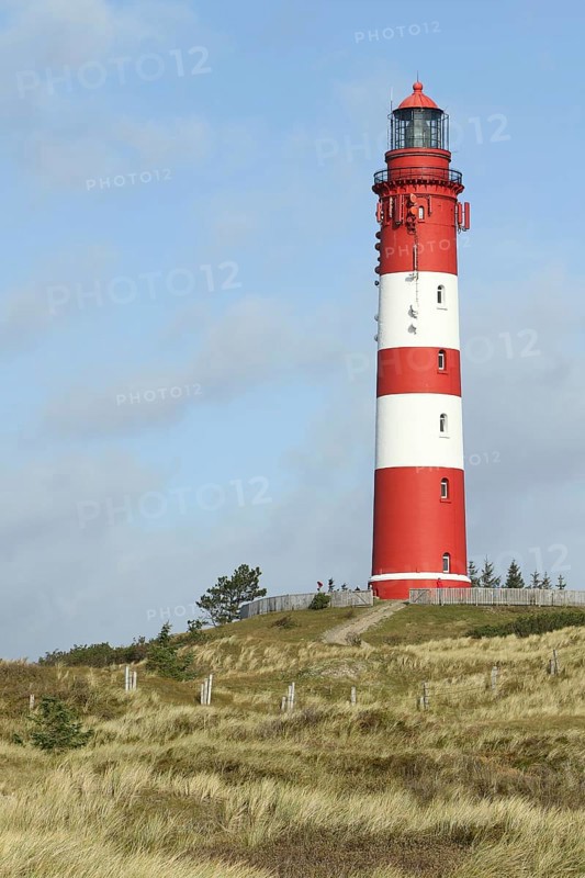 Lighthouse in dune landscape