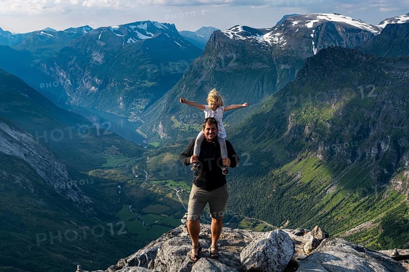 Father with daughter standing on Dalsnibba View point