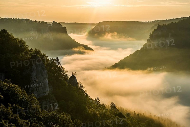 View from Eichfelsen to Werenwag Castle with morning fog