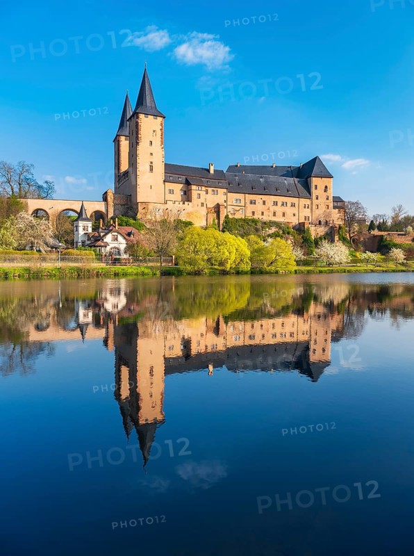 Rochlitz Castle reflected in the river Zwickauer Mulde