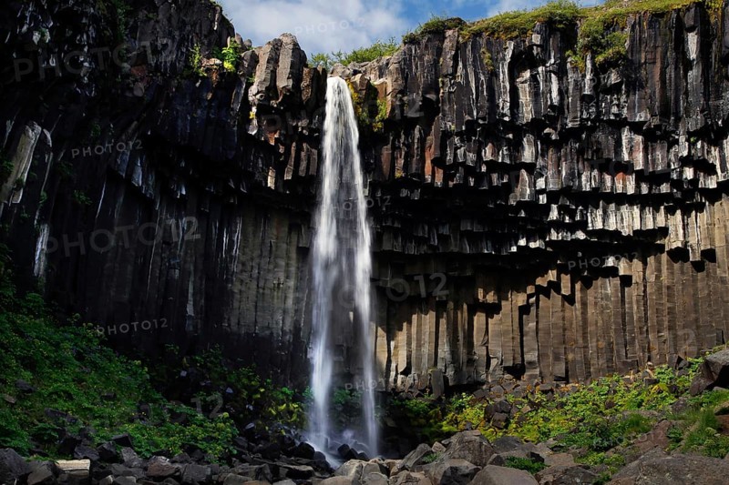 Columnar basalt with waterfall