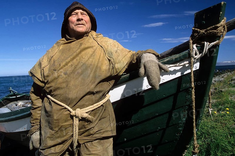 Fisherman with fishing boat