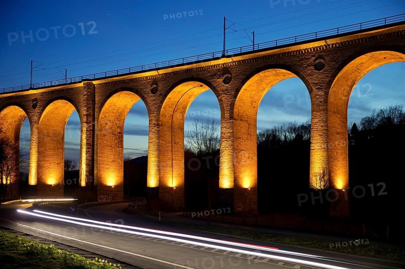 Illuminated viaduct in the evening