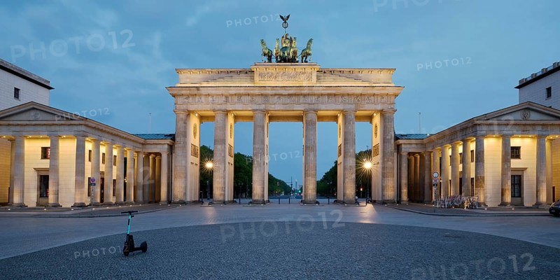 Illuminated Brandenburg Gate in the morning