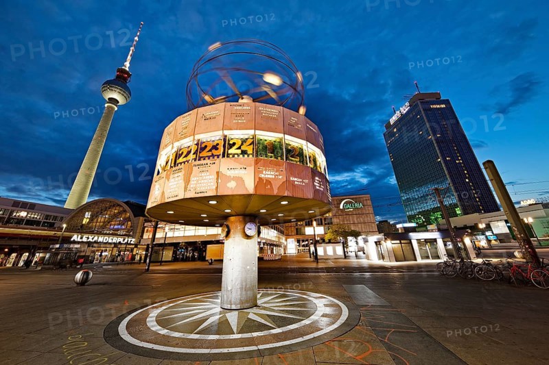 Alexanderplatz with the Berlin TV Tower and the Urania World Clock in the evening