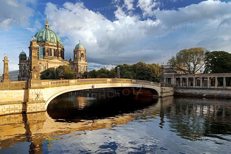 Berlin Cathedral on Museum Island with Friedrichsbruecke over the Spree