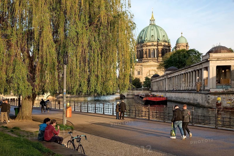 People in James Simon Park with Berlin Cathedral and the Spree River