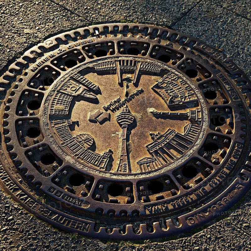 Berlin sights on a manhole cover of the Berliner Wasserbetriebe