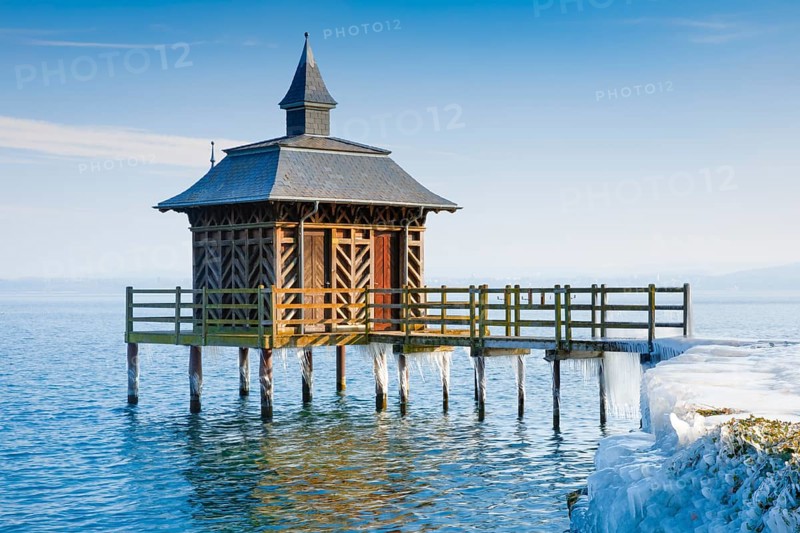 Iced wooden bathhouse on Lake Neuchatel in Gorgier