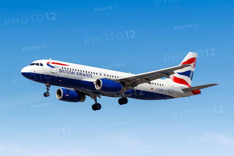 A British Airways Airbus A320 with the registration G-EUUD lands at London Heathrow Airport