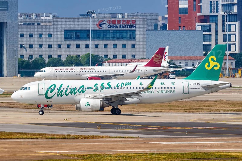 A Spring Airlines Airbus A320 with registration number B-9940 at Shanghai Hongqiao Airport