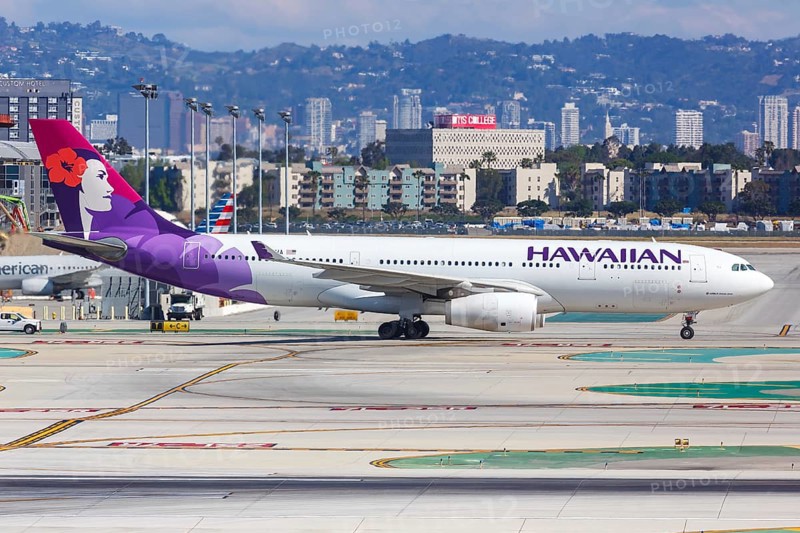 An Airbus A330-200 aircraft of Hawaiian Airlines with registration N395HA at Los Angeles Airport