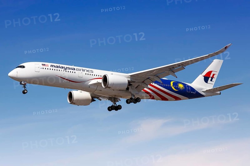 A Malaysia Airlines Airbus A350-900 with registration number 9M-MAF lands at London Heathrow Airport