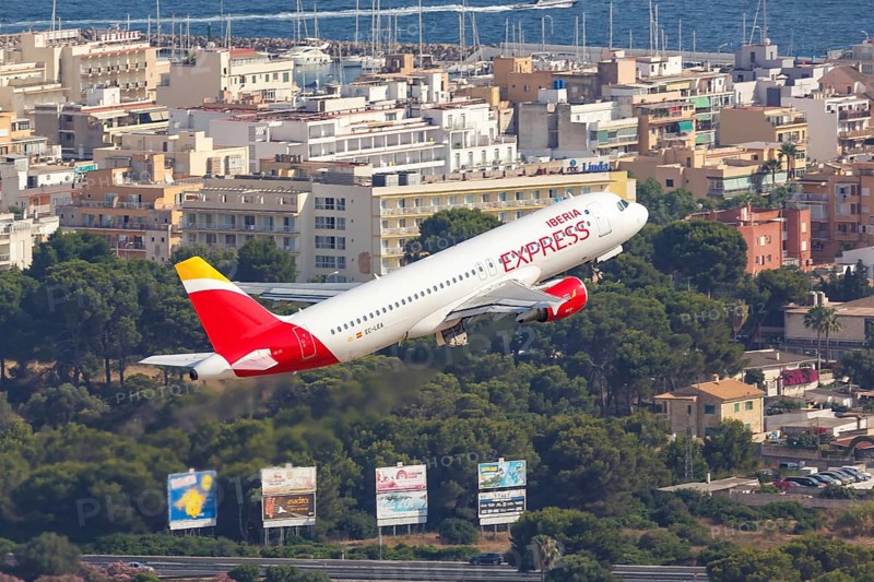 An Iberia Express Airbus A320 with the registration EC-LEA takes off from Palma de Majorca Airport