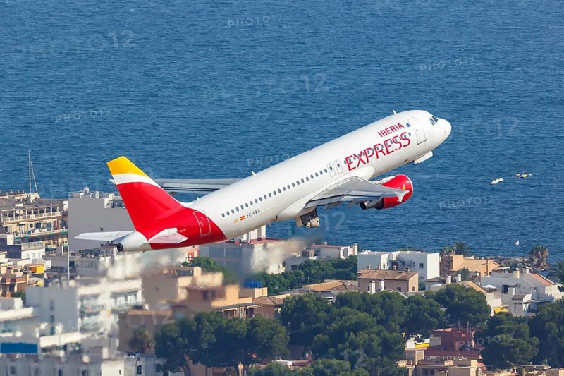 An Iberia Express Airbus A320 with the registration EC-LEA takes off from Palma de Majorca Airport