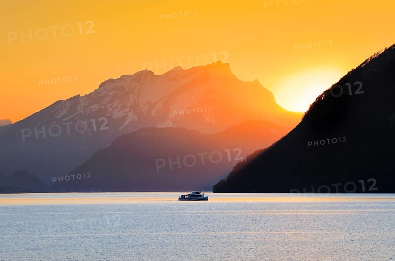 Lake with mountains in the background