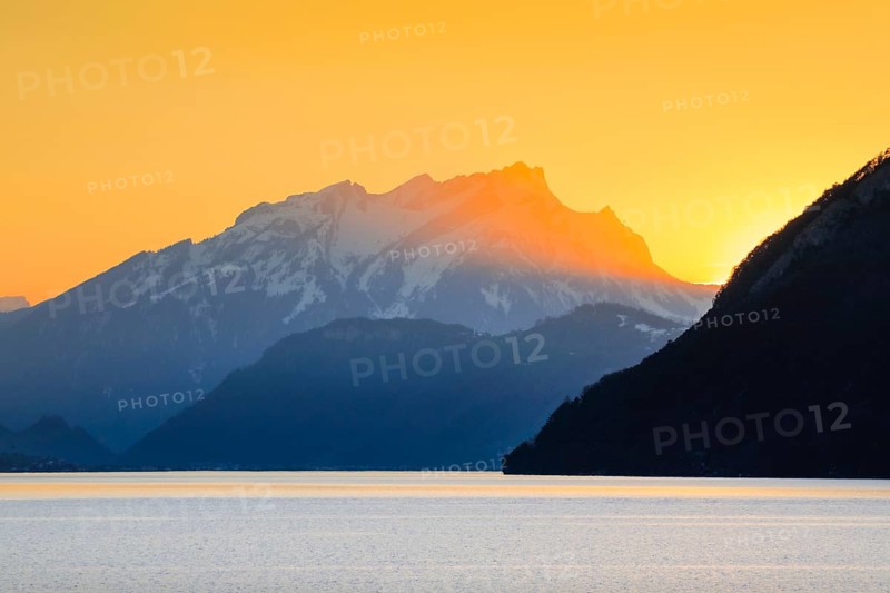 Lake with mountains in the background