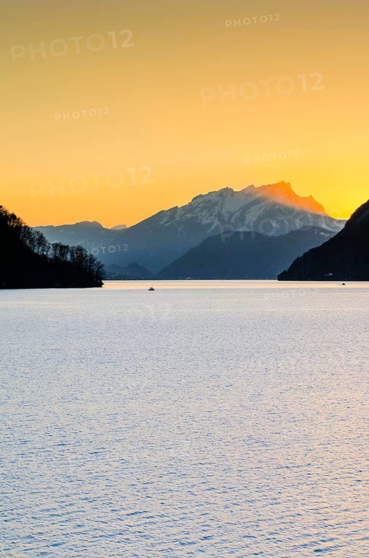 Lake with mountains in the background