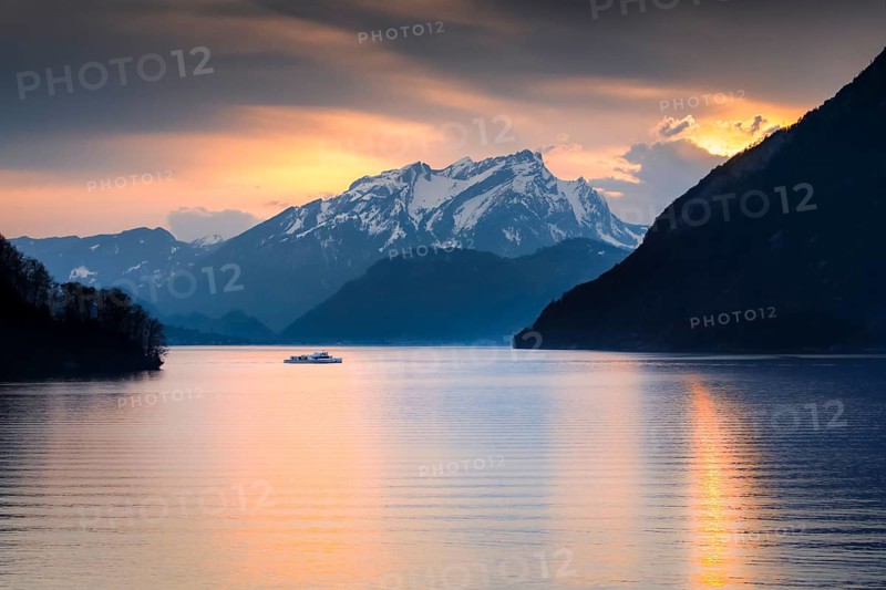 Lake with mountains in the background