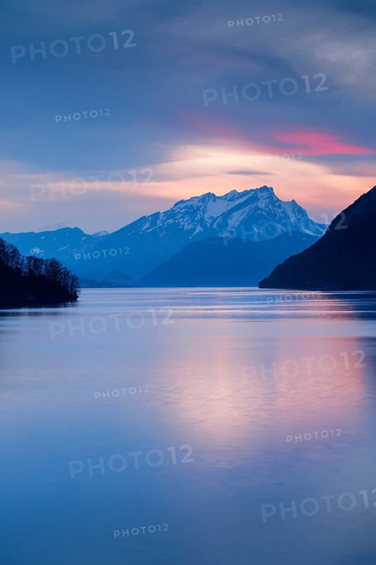 Lake with mountains in the background