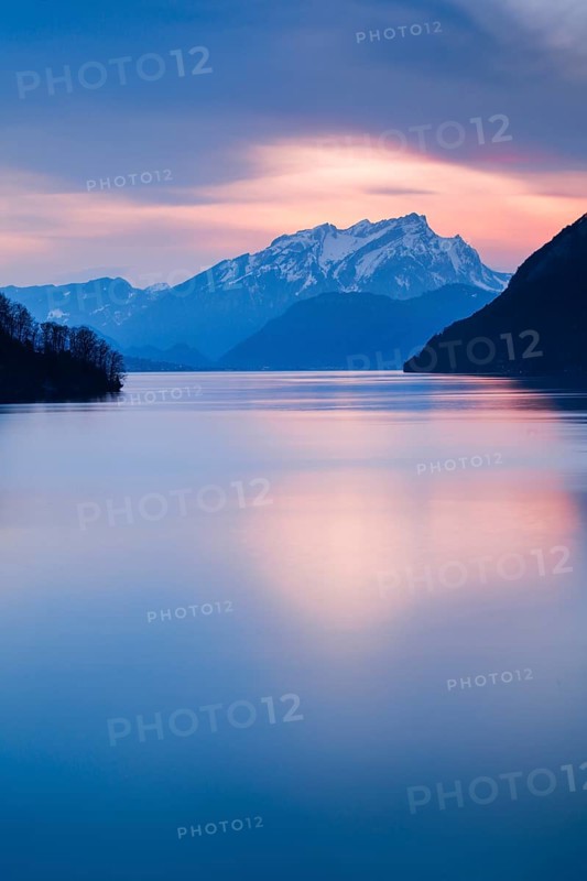 Lake with mountains in the background