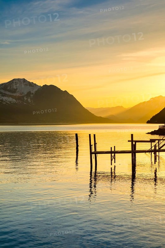 Lake with mountains in the background