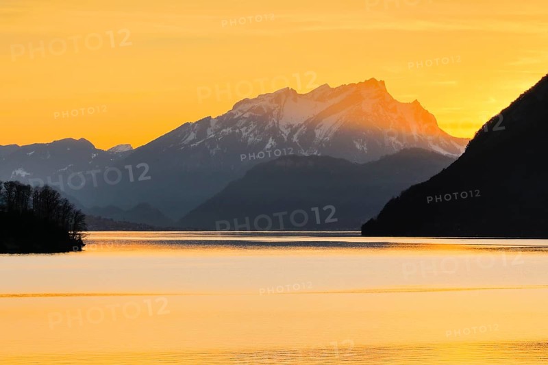 Lake with mountains in the background