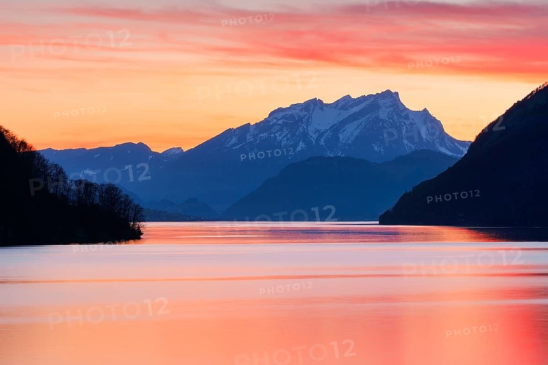 Lake with mountains in the background
