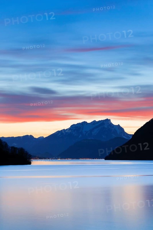 Lake with mountains in the background