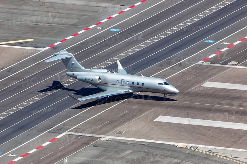 A Bombardier Challenger 350 of VistaJet with the registration 9H-VCE at Gibraltar Airport