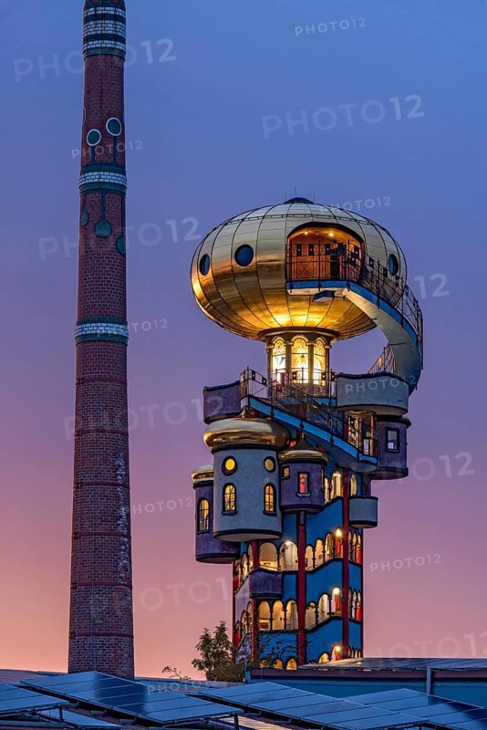 Kuchlbauer Tower or Hundertwasser Tower by Friedensreich Hundertwasser and Peter Pelican with chimney of the Kuchlbauer brewery