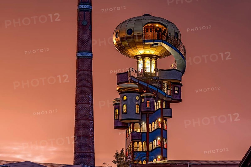 Kuchlbauer Tower or Hundertwasser Tower by Friedensreich Hundertwasser and Peter Pelican with chimney of the Kuchlbauer brewery