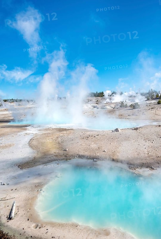 Steaming hot springs with turquoise water