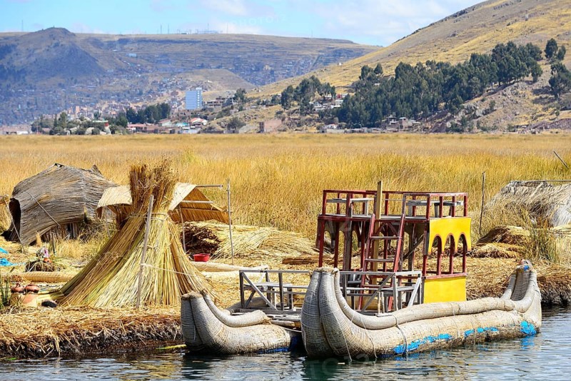 Typical reed boats at a floating island of the Uro