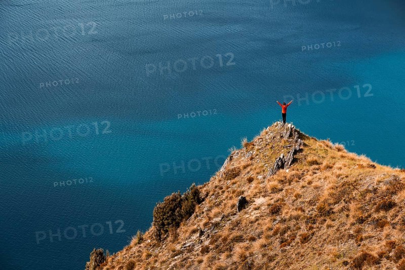 Guy on a mountain at Lake Hawea