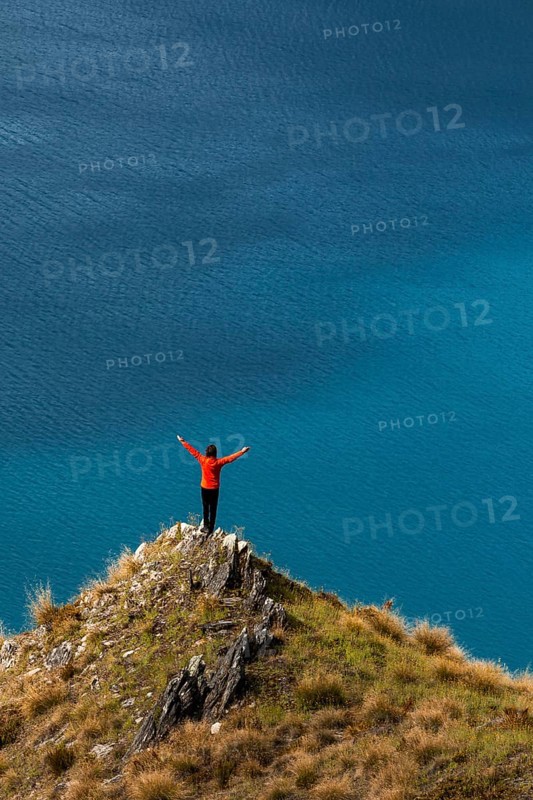 Guy on a mountain at Lake Hawea