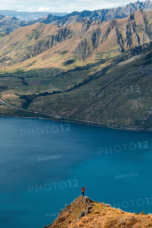 Guy on a mountain at Lake Hawea