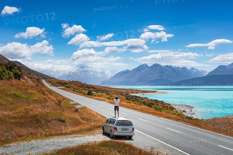 Guy on a car roof