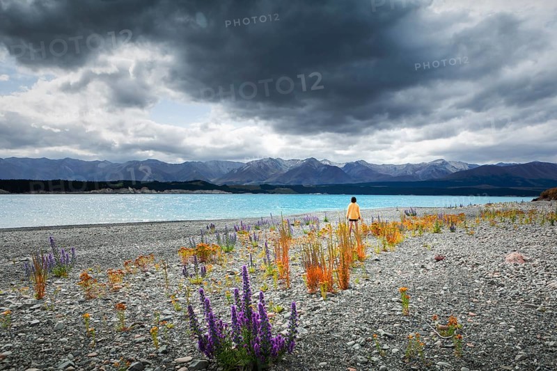 Guy at a beach at Lake Tekapo