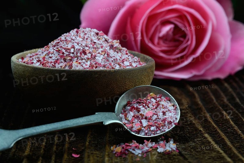 Rose salt in bowl and spoon