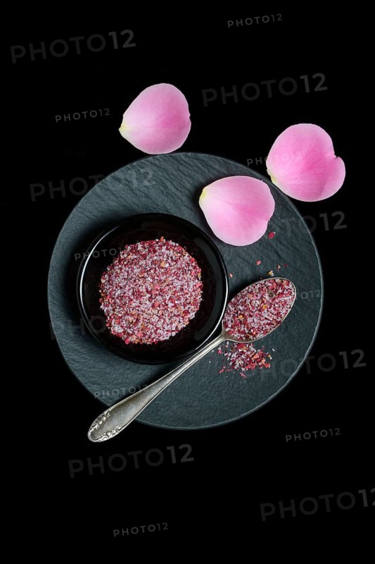 Rose salt in bowl and spoon